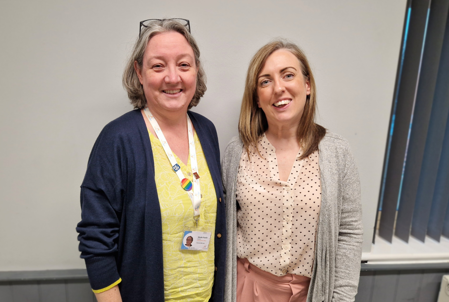 Picture shows two women stood side by side smiling at the camera. On the left is Active Impact CEO Nicole Hastie and on the right is Active Impact Trustee Vicci Livingstone-Thompson